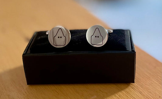 Gemelos de acero con dibujo de Nazareno